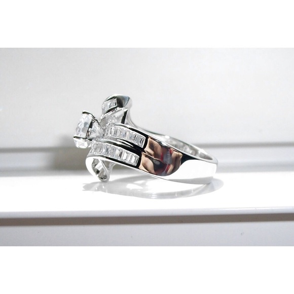 925 STERLING SILVER Cubic Zirconia Twist Ring With Baguettes - Picture 9 of 16